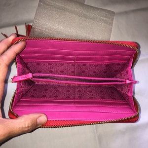 Tasseled Stella & Dot wallet in poppy.